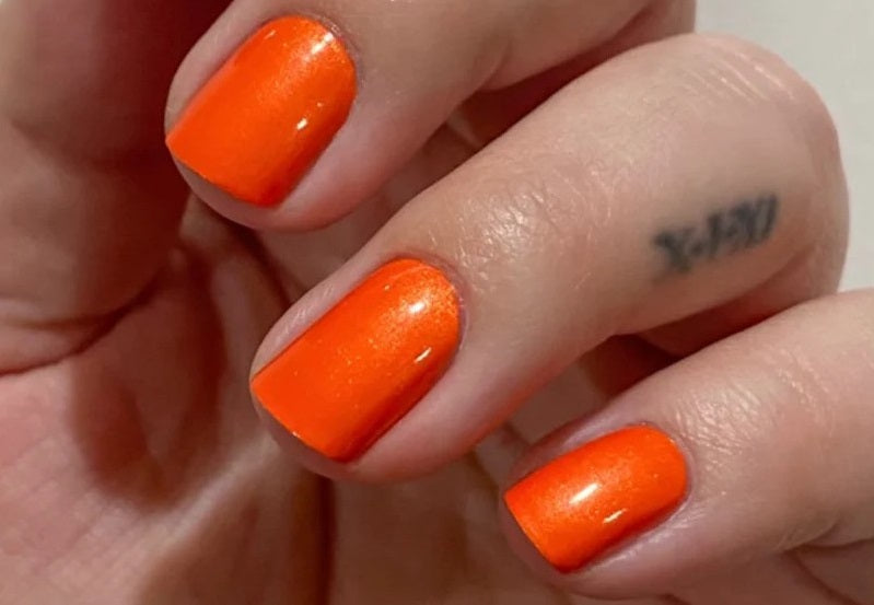 Nail_Polish_Colors_to_Stun_in_an_Orange_Dress